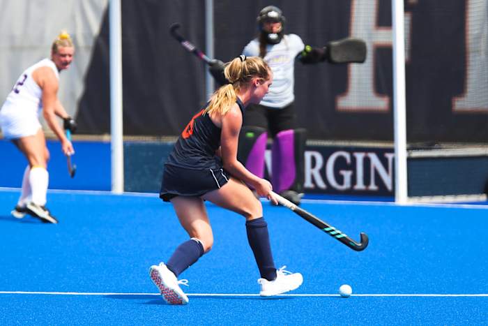 Virginia field hockey midfielder Lauren Kenah attempts a shot.